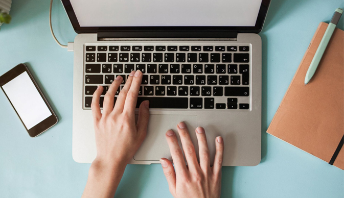 Laptop and hands typing